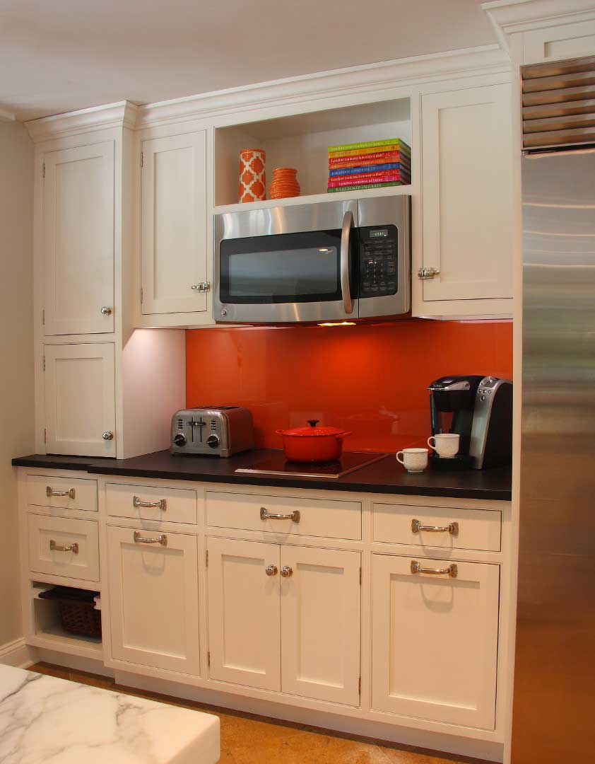 Kitchen with White Cabinets and Dark Countertop
